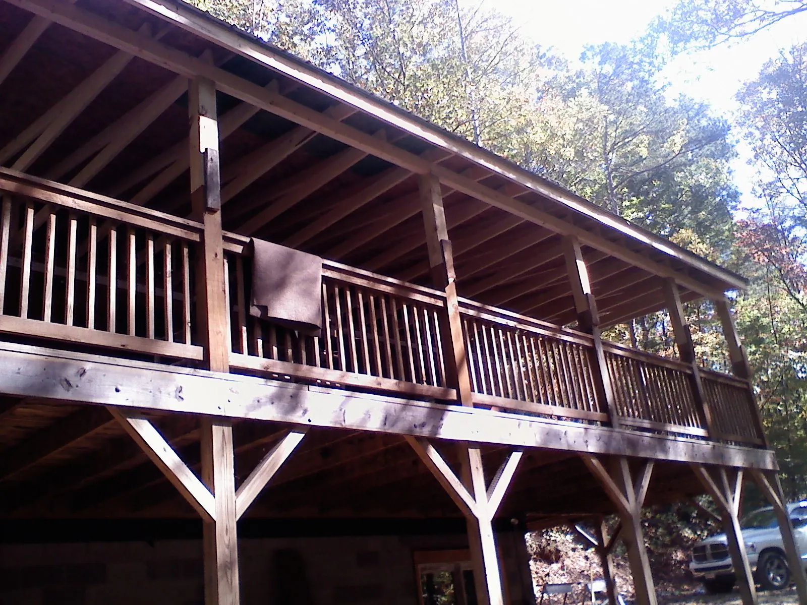 Timber framing under a new elevated porch and deck — Roof Leak Repair in East Bend by Roofing Brothers